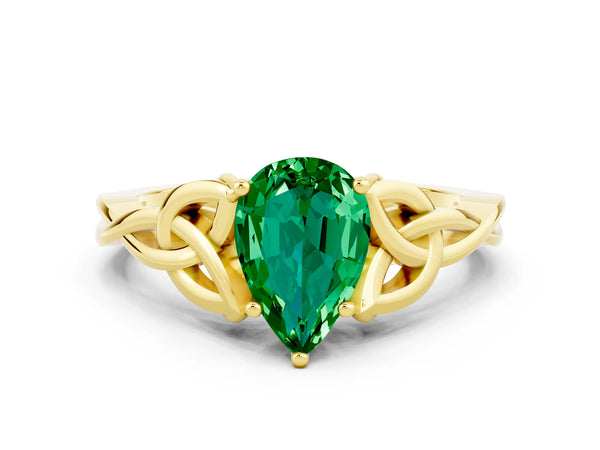 Yellow gold Pear Cut Emerald Solitaire Celtic Knot Ring with Four-Prong Setting