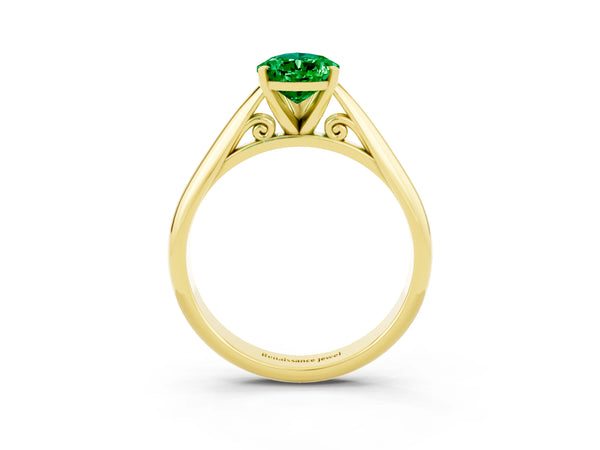 Yellow gold Pear Cut Emerald Solitaire Engagement Ring with Cathedral Setting and Four-Prong Mount