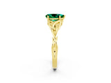 Yellow gold Pear Cut Emerald Solitaire Engagement Ring with Celtic Knot Band and Four-Prong Setting_2