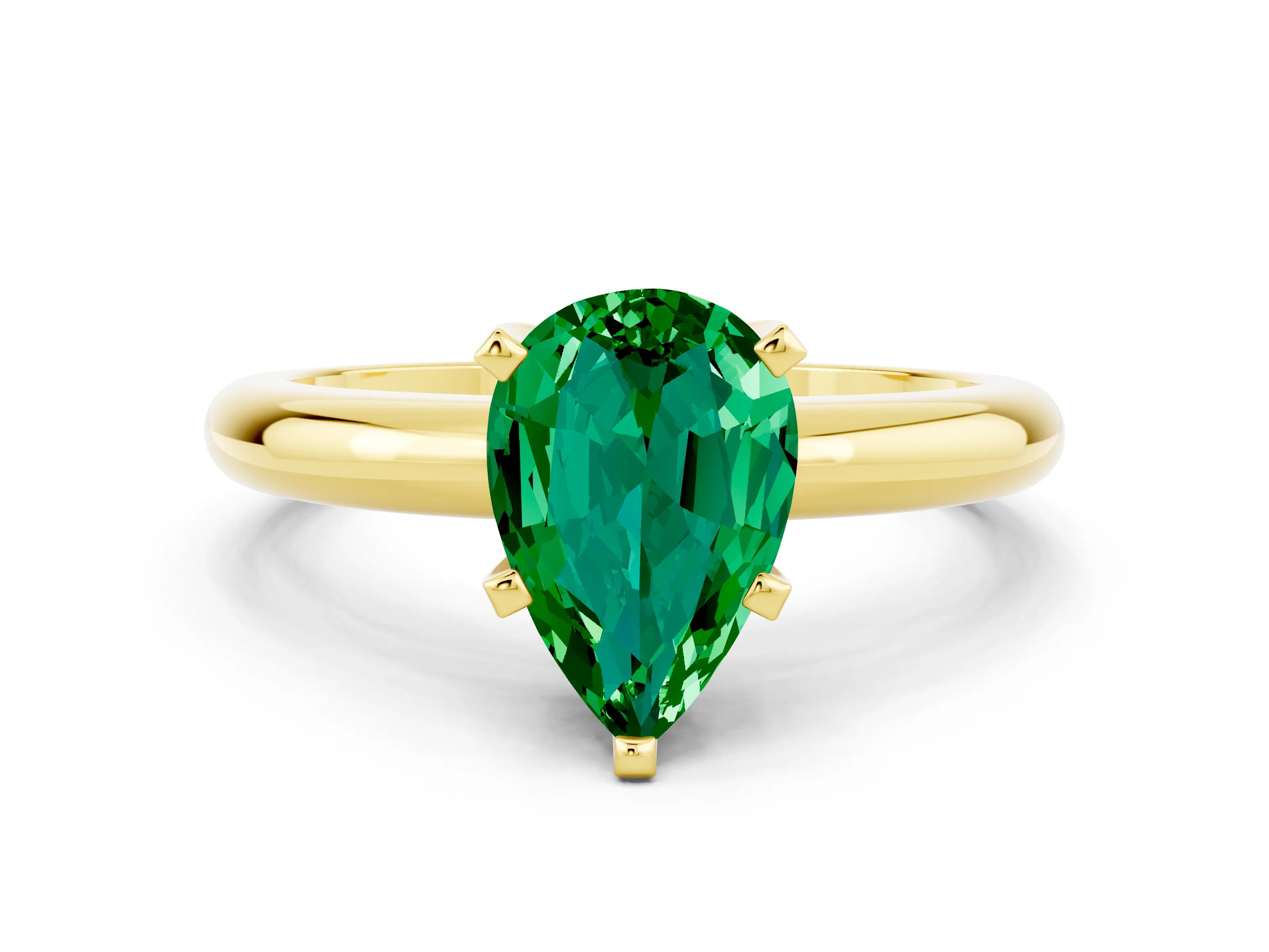 Yellow gold Pear Cut Emerald Solitaire Engagement Ring with Round Band and Four-Prong Setting