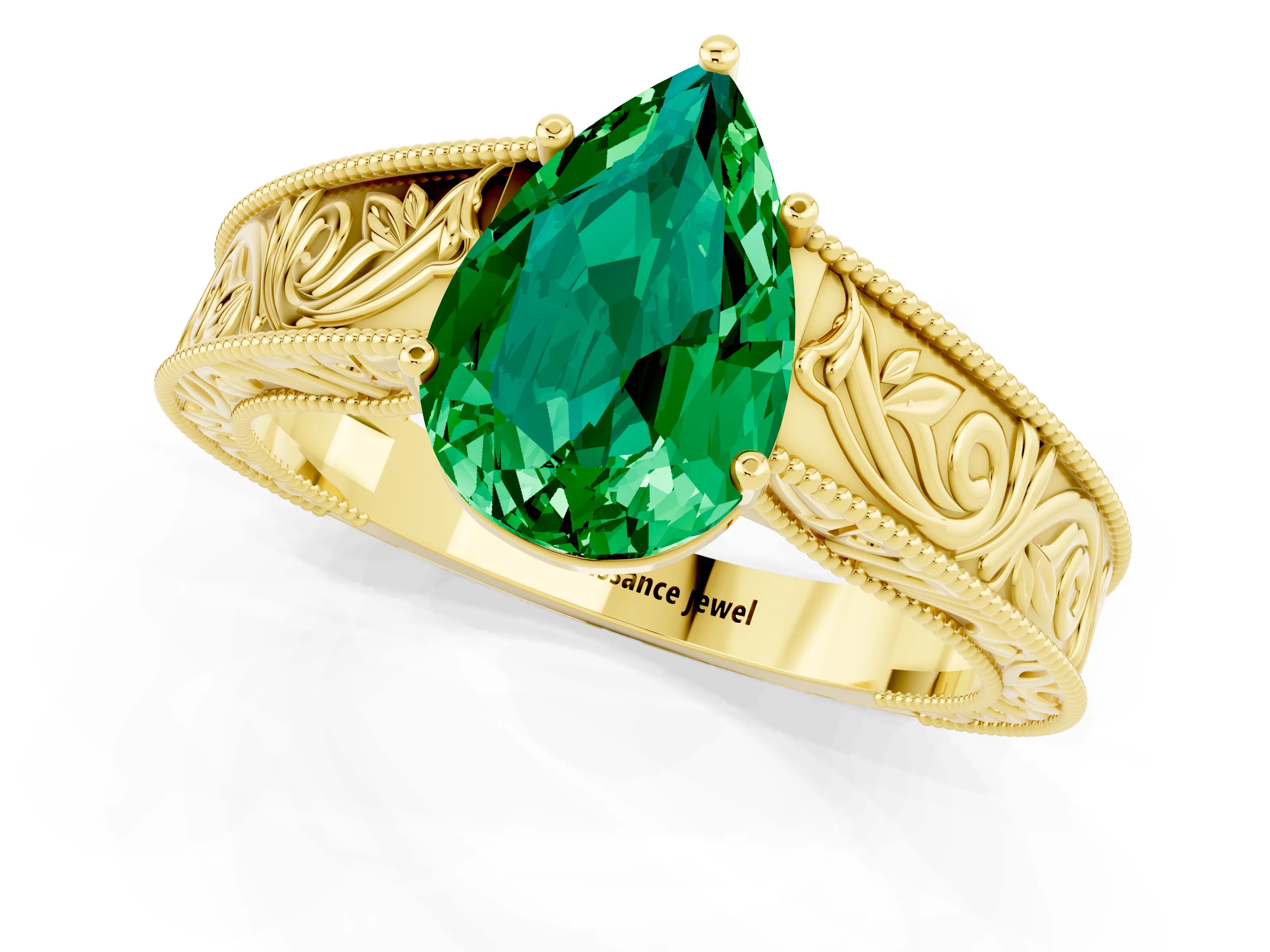 Yellow gold Pear Cut Emerald Solitaire Ring with Engraved Band and Four-Prong Setting_1