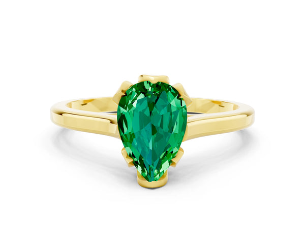 Yellow gold Pear Cut Emerald Solitaire Ring with Flower Prong Setting and Classic Band