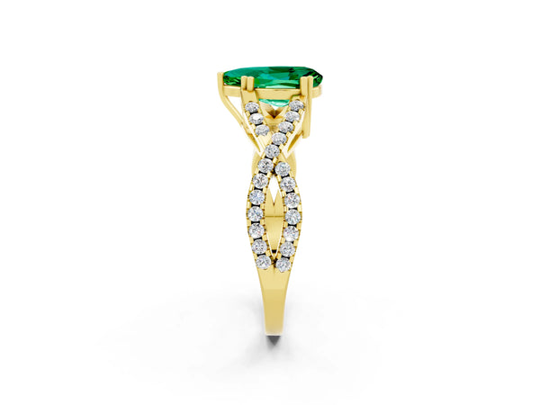Yellow gold Pear Cut Emerald Solitaire Ring with Four-Prong Setting and Twisted Pavé Band