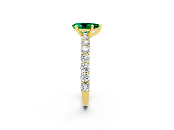 Yellow gold Pear Cut Emerald Solitaire Ring with Shared Prong Pavé Band and Four-Prong Setting