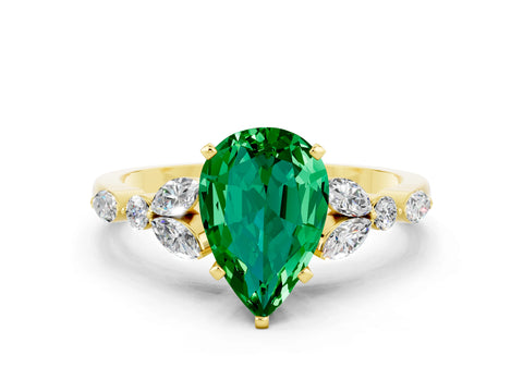 Yellow gold Pear Cut Emerald Solitaire Ring with Side Stones and Four-Prong Setting_12