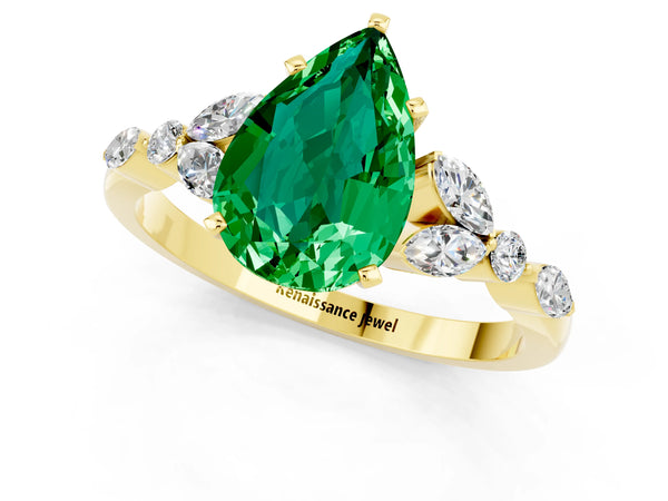 Yellow gold Pear Cut Emerald Solitaire Ring with Side Stones and Four-Prong Setting