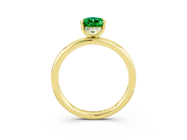 Yellow gold Pear Cut Emerald Solitaire Ring with Thin Band and Four-Prong Setting
