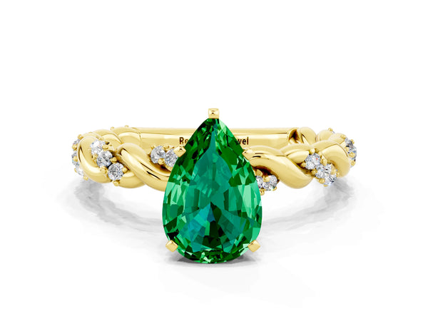 Yellow gold Pear Cut Emerald Solitaire Ring with Twisted Band and Pavé Accents