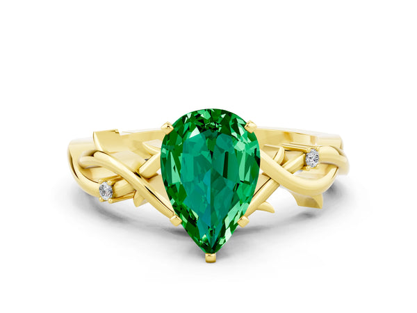 Yellow gold Pear Cut Emerald Solitaire Ring with Twisted Band and Prong Setting