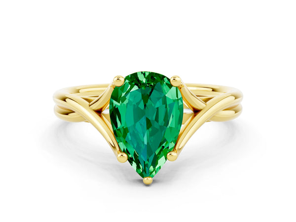 Yellow gold Pear Cut Emerald Solitaire Twist Band Prong Setting Ring