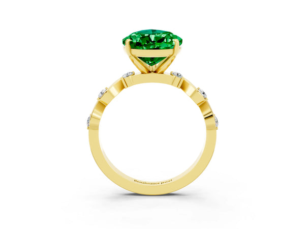 Yellow gold Pear Cut Emerald Solitaire Twisted Band with Round  Accents and Prong Setting