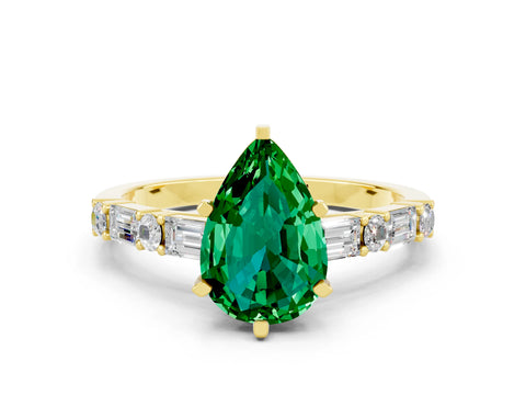 Yellow gold Pear Cut Emerald Solitaire with Side Baguettes and Channel Set Band