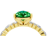 Yellow gold Pear Cut Emerald Solitaire with Side Stones, Pave Band, Four-Prong Setting_40