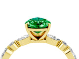Yellow gold Pear Cut Emerald Solitaire with Side Stones on a Pavé Band and Four-Prong Setting_4