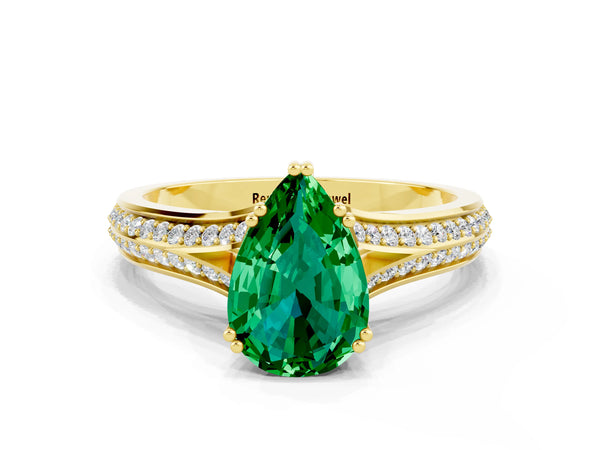 Yellow gold Pear Cut Emerald Split Shank Engagement Ring with Pavé Band