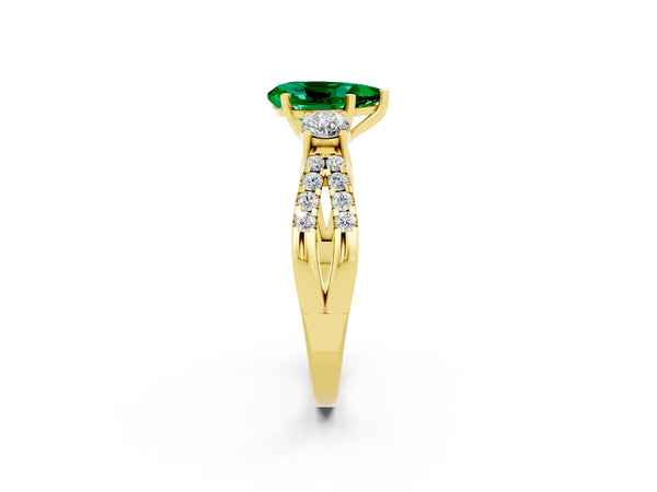 Yellow gold Pear Cut Emerald Three-Stone Ring with Pavé Split Shank and Four-Prong Setting