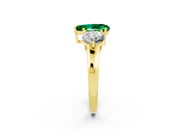 Yellow gold Pear Cut Emerald Three-Stone Ring with Prong Setting and Classic Band