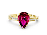 Yellow gold Pear Cut Garnet Engagement Ring with Side Stone Accents and Four-Prong Setting_60