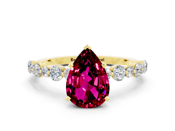 Yellow gold Pear Cut Garnet Prong Set Engagement Ring with Pavé Band