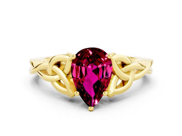 Yellow gold Pear Cut Garnet Solitaire Celtic Knot Ring with Four-Prong Setting