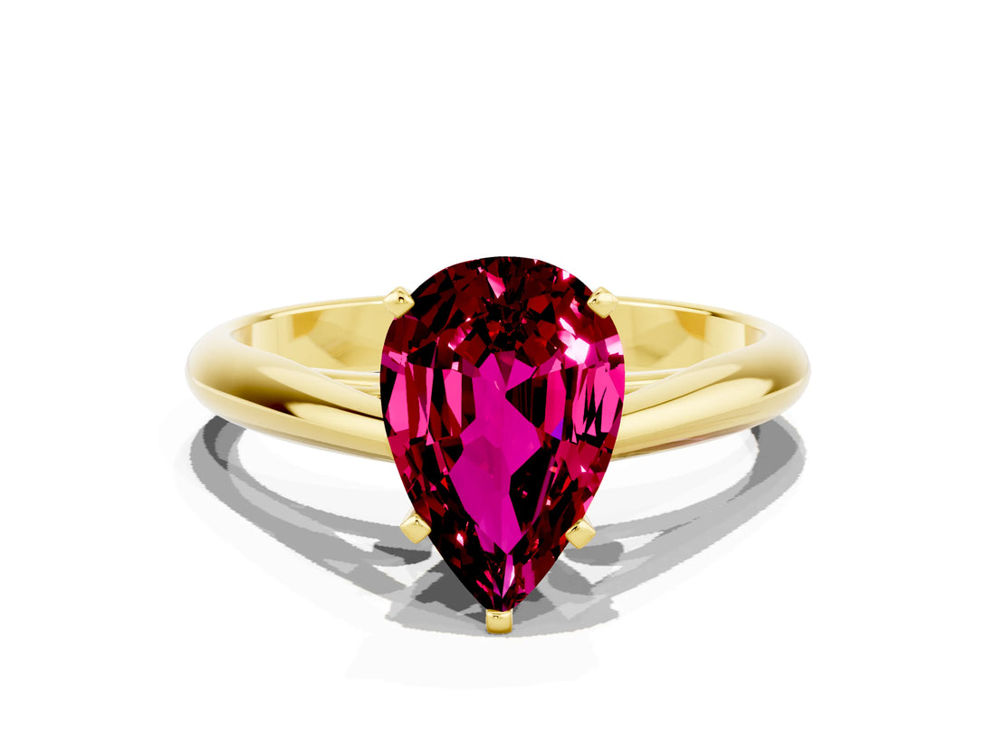 Yellow gold Pear Cut Garnet Solitaire Engagement Ring with Cathedral Setting and Four-Prong Mount_84