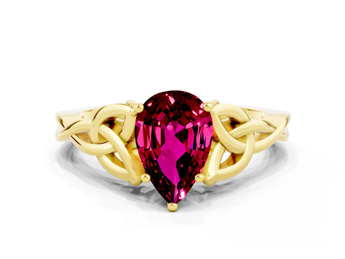 Yellow gold Pear Cut Garnet Solitaire Engagement Ring with Celtic Knot Band and Four-Prong Setting