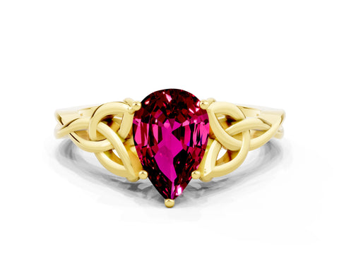 Yellow gold Pear Cut Garnet Solitaire Engagement Ring with Celtic Knot Band and Four-Prong Setting