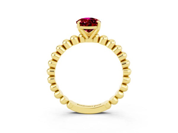 Yellow gold Pear Cut Garnet Solitaire Ring with Beaded Band and Prong Setting