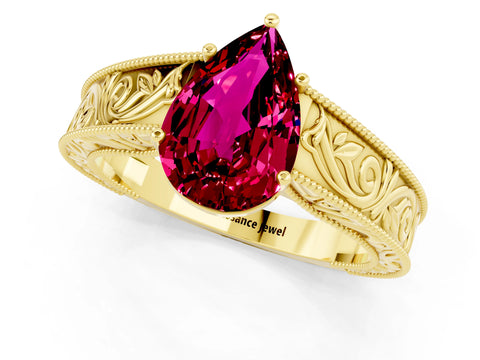 Yellow gold Pear Cut Garnet Solitaire Ring with Engraved Band and Four-Prong Setting_1