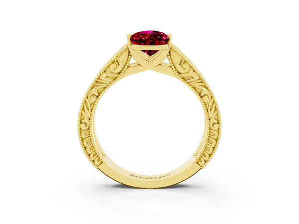Yellow gold Pear Cut Garnet Solitaire Ring with Engraved Band and Four-Prong Setting