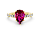 Yellow gold Pear Cut Garnet Solitaire Ring with Pavé Accents and Four-Prong Setting