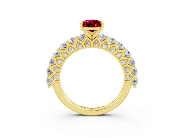 Yellow gold Pear Cut Garnet Solitaire Ring with Shared Prong Pavé Band and Four-Prong Setting
