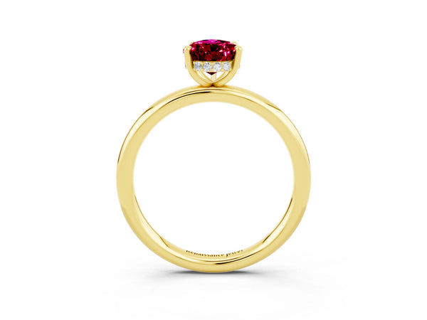 Yellow gold Pear Cut Garnet Solitaire Ring with Thin Band and Four-Prong Setting