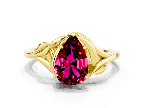 Yellow gold Pear Cut Garnet Solitaire Ring with Twist Band and Four-Prong Setting