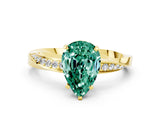 Yellow gold Pear Cut Green Sapphire Engagement Ring with Side Stone Accents and Four-Prong Setting_60