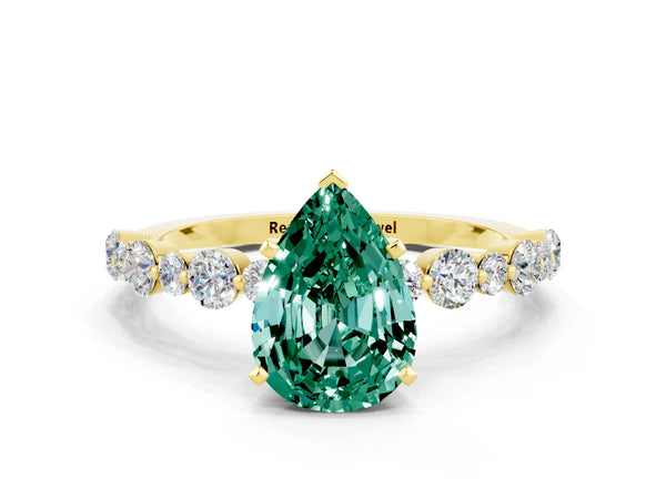 Yellow gold Pear Cut Green Sapphire Prong Set Engagement Ring with Pavé Band
