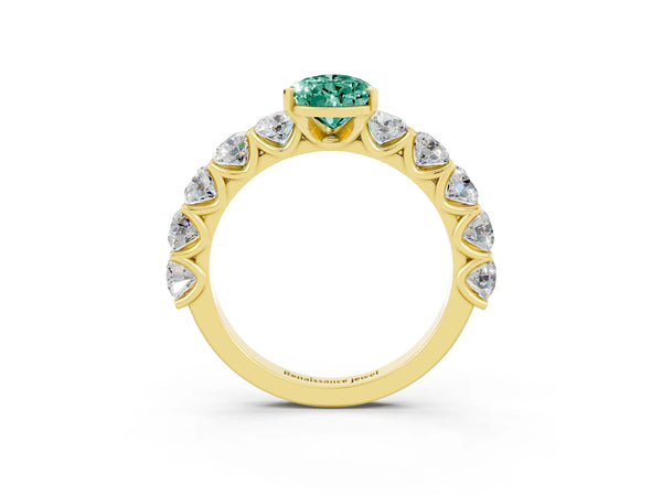 Yellow gold Pear Cut Green Sapphire Prong Setting with Side Stones on a Pave Band