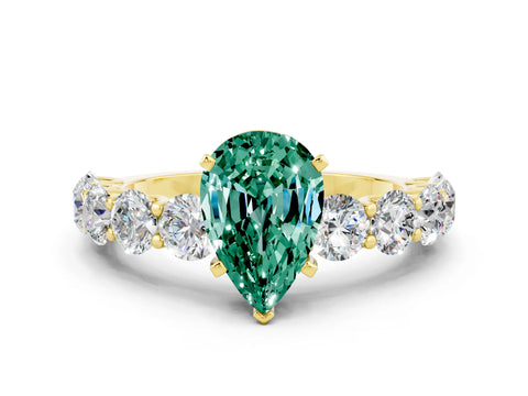 Yellow gold Pear Cut Green Sapphire Prong Setting with Side Stones on a Pave Band