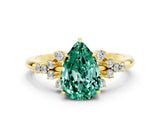 Yellow gold Pear Cut Green Sapphire Ring with Side Stones and Four-Prong Setting_36