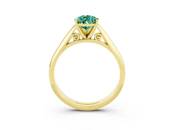 Yellow gold Pear Cut Green Sapphire Solitaire Engagement Ring with Cathedral Setting and Four-Prong Mount