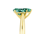 Yellow gold Pear Cut Green Sapphire Solitaire Engagement Ring with Cathedral Setting and Four-Prong Mount_71