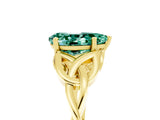 Yellow gold Pear Cut Green Sapphire Solitaire Engagement Ring with Celtic Knot Band and Four-Prong Setting_5