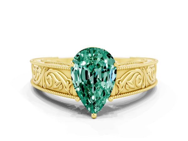 Yellow gold Pear Cut Green Sapphire Solitaire Ring with Engraved Band and Four-Prong Setting