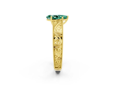 Yellow gold Pear Cut Green Sapphire Solitaire Ring with Engraved Band and Four-Prong Setting_2