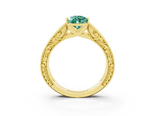 Yellow gold Pear Cut Green Sapphire Solitaire Ring with Engraved Band and Four-Prong Setting