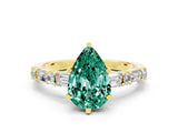 Yellow gold Pear Cut Green Sapphire Solitaire with Side Baguettes and Channel Set Band