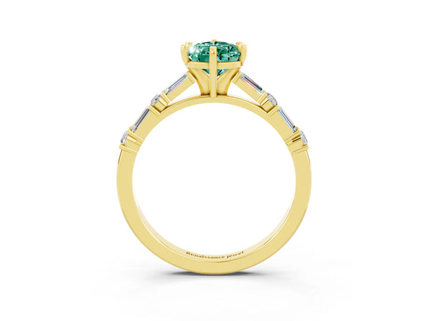 Yellow gold Pear Cut Green Sapphire Solitaire with Side Baguettes and Channel Set Band
