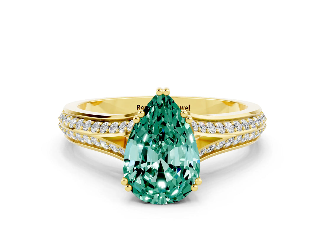 Yellow gold Pear Cut Green Sapphire Split Shank Engagement Ring with Pavé Band