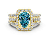 Yellow gold Pear Cut Halo Blue Topaz Ring with Split Shank and Four-Prong Setting