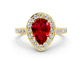 Yellow gold Pear Cut Halo Diamond Ring with Pavé Band and Three-Prong Setting